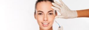Woman receiving cosmetic injection at Boca Raton dermatology clinic